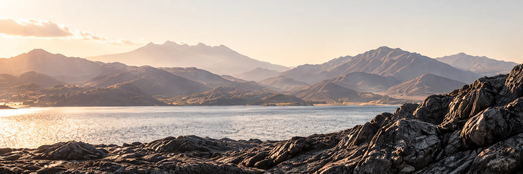 Sunlit lake and mountains — landscape concept image